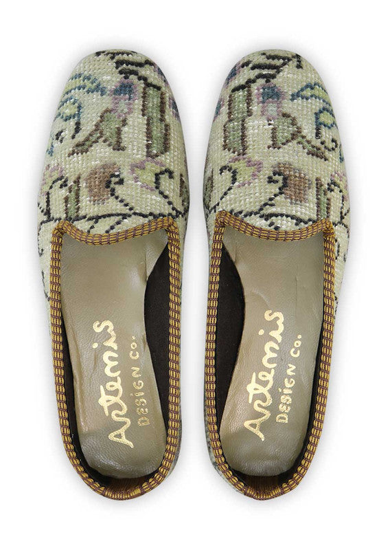 The Artemis Women's Loafer presents a delightful color combination of khaki, black, peach, light grey, blue, and light green. These loafers boast a harmonious blend of earthy and pastel tones, creating a refreshing and fashionable look. (Front View)