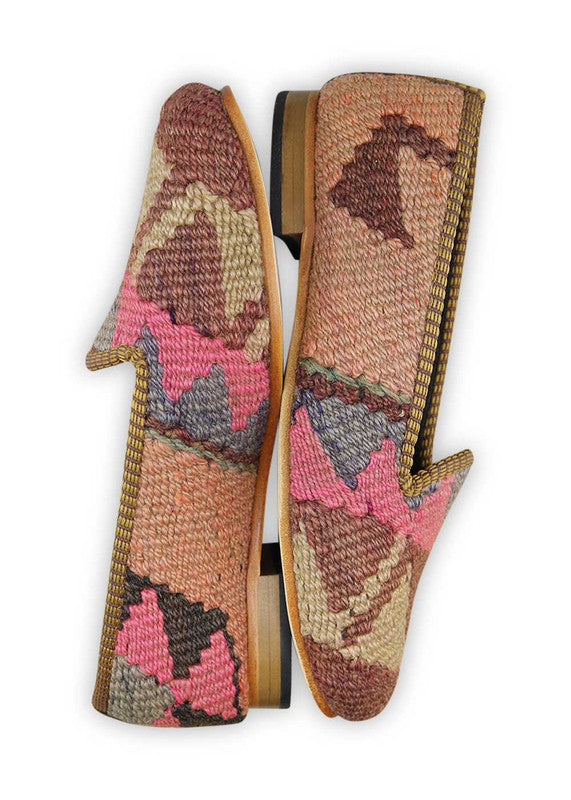 The Artemis Women's Loafer showcases a captivating color combination of khaki, fuschia, grey, peach, brown, and black. These loafers offer a delightful mix of earthy and bold tones, creating a unique and stylish look. (Side View)