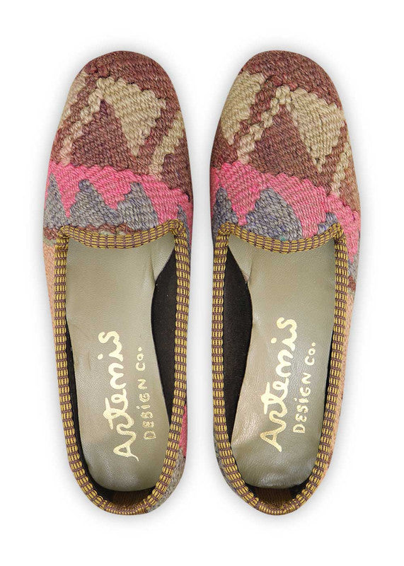 The Artemis Women's Loafer showcases a captivating color combination of khaki, fuschia, grey, peach, brown, and black. These loafers offer a delightful mix of earthy and bold tones, creating a unique and stylish look. (Front View)
