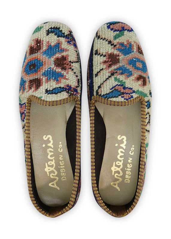 The Artemis Women's Loafer presents a delightful color combination of khaki, black, peach, light grey, blue, and light green. These loafers boast a harmonious blend of earthy and pastel tones, creating a refreshing and fashionable look.  (Front View)