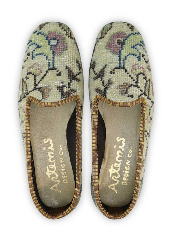 The Artemis Women's Loafer presents a delightful color combination of khaki, black, peach, light grey, blue, and light green. These loafers boast a harmonious blend of earthy and pastel tones, creating a refreshing and fashionable look. (Front View)