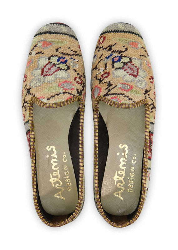 The Artemis Women's Loafer showcases a chic color combination of khaki, brown, black, peach, grey, and white. These loafers are the epitome of style and versatility, featuring a blend of neutral and subtle tones that effortlessly elevate any outfit.  (Front View)