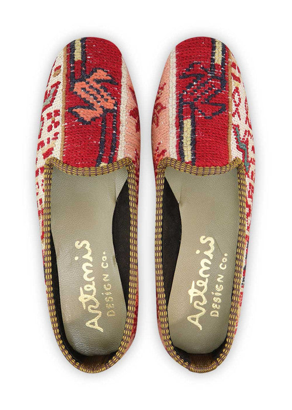 The Artemis Women's Loafer boasts a stunning and vibrant color combination, featuring shades of red, khaki, peach, white, green, and blue. With a chic and stylish design, these loafers offer both comfort and sophistication, making them the perfect accessory for any outfit. (Front View)