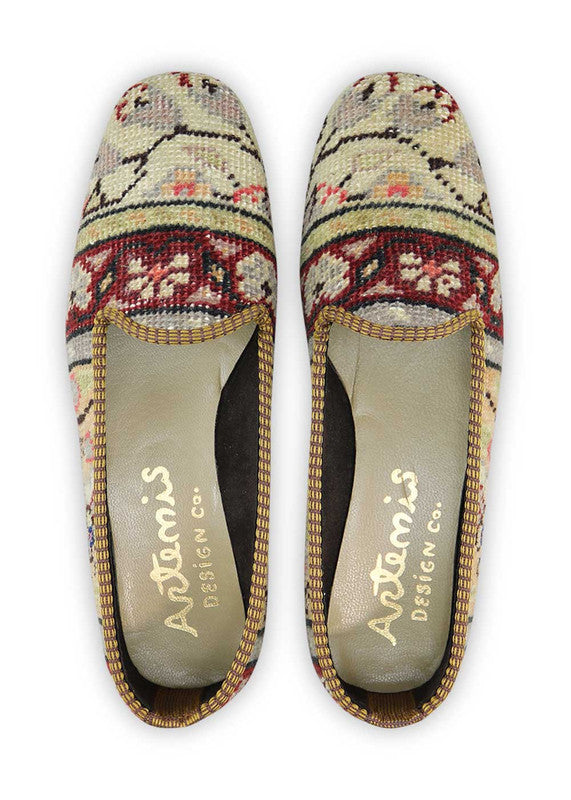 These loafers exude a timeless elegance with their refined and versatile hues. The khaki shade offers a neutral and earthy tone, while the navy blue and grey accents provide a classic and versatile backdrop. The black elements add a touch of sophistication, and the sky blue hue brings a refreshing and vibrant pop of color to the mix.  (Front View)