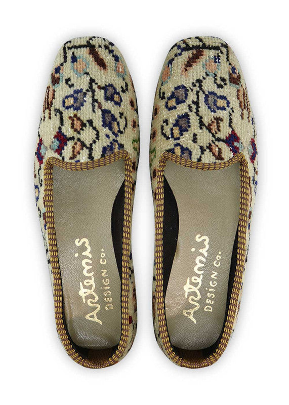 These loafers exude a timeless elegance with their refined and versatile hues. The khaki shade offers a neutral and earthy tone, while the navy blue and grey accents provide a classic and versatile backdrop. The black elements add a touch of sophistication, and the sky blue hue brings a refreshing and vibrant pop of color to the mix.  (Front View)