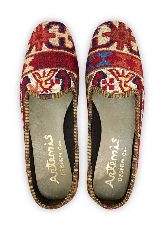 These loafers exude a vibrant and refreshing aura, blending rich and playful hues. The bold red and red orange tones command attention, while the khaki and white elements provide a balanced and versatile base. The teal and mint green accents add a touch of coolness and liveliness to the mix. With their comfortable fit and classic loafer design, these Artemis Women's Loafers are the perfect combination of style and comfort. (Front View)