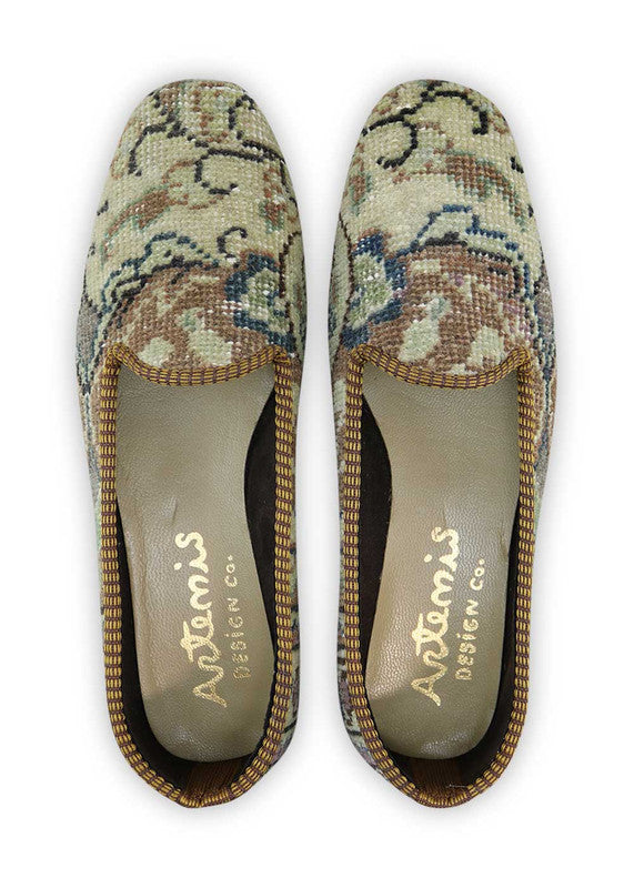 These loafers effortlessly blend earthy and pastel tones, creating a harmonious and soothing palette. The khaki and light brown hues offer a grounded and neutral base, while the light green, blue, and lilac accents add a touch of freshness and femininity. With their comfortable fit and timeless loafer design, these Artemis Women's Loafers are both stylish and versatile. (Front View)