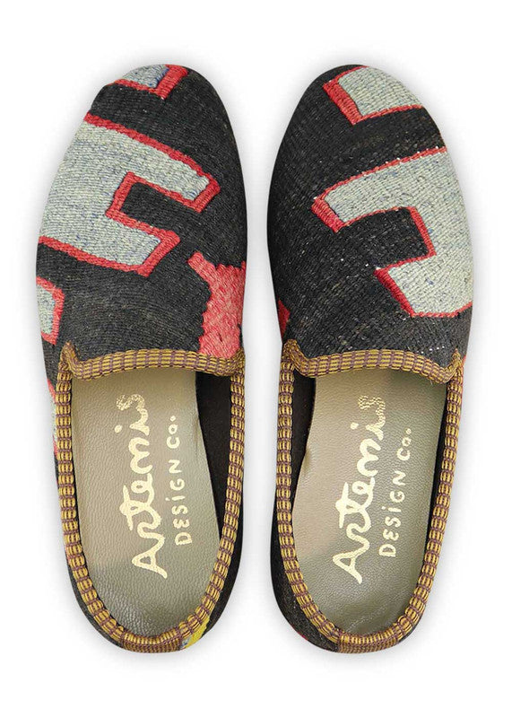 The Artemis Women's Smoking Shoe features a sleek color combination of red, black, grey, and yellow. These smoking shoes offer a chic mix of bold and neutral tones, creating a stylish and versatile look. (Front View)