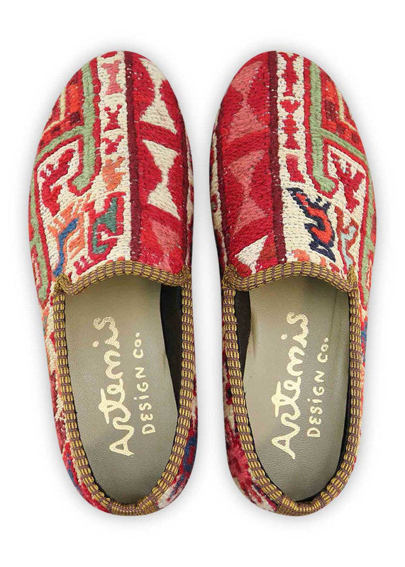 The Artemis Women's Smoking Shoe showcases a delightful color combination of red, white, blue, teal, khaki, peach, brown, and green. These smoking shoes offer a harmonious mix of vibrant and earthy tones, creating a stylish and versatile look. (Front View)