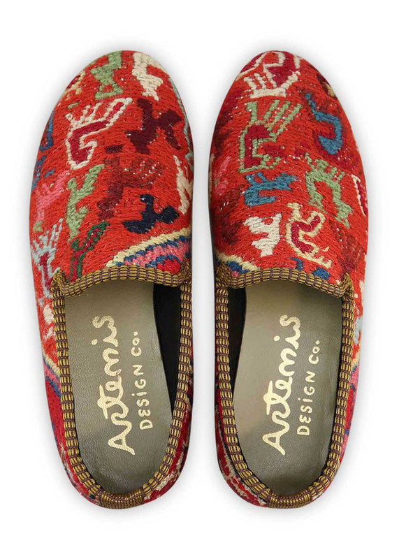 The Artemis Women's Smoking Shoe presents a vibrant color palette featuring peach, red, teal, brown, black, blue, pink, and white. These smoking shoes offer a striking and playful mix of energetic tones, creating a chic and eye-catching look.  (Front View)