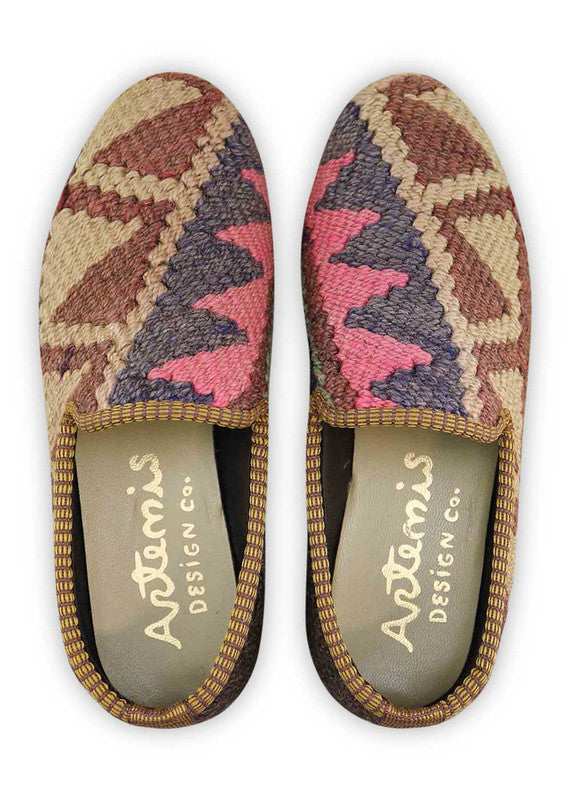The Artemis Women's Smoking Shoe showcases a sophisticated color combination of dark grey, pink, grey, brown, and khaki. These smoking shoes offer a chic mix of neutral and soft tones, creating a versatile and stylish look. (Front View)
