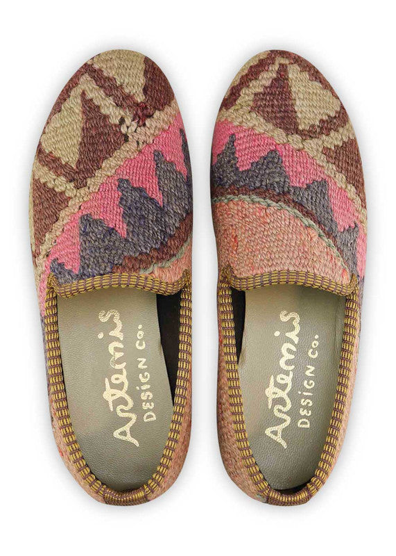 The Artemis Women's Smoking Shoe showcases a charming color combination of peach, brown, dark grey, khaki, and pink. These smoking shoes offer a delightful mix of soft and earthy tones, creating a chic and versatile look.  (Front View)