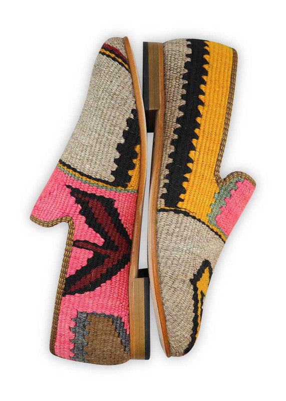 The Artemis Women's Smoking Shoe presents a stylish color combination of grey, black, yellow, pink, maroon, and khaki. These smoking shoes offer a delightful mix of neutral and vibrant tones, creating a chic and trendy look.  (Side View)