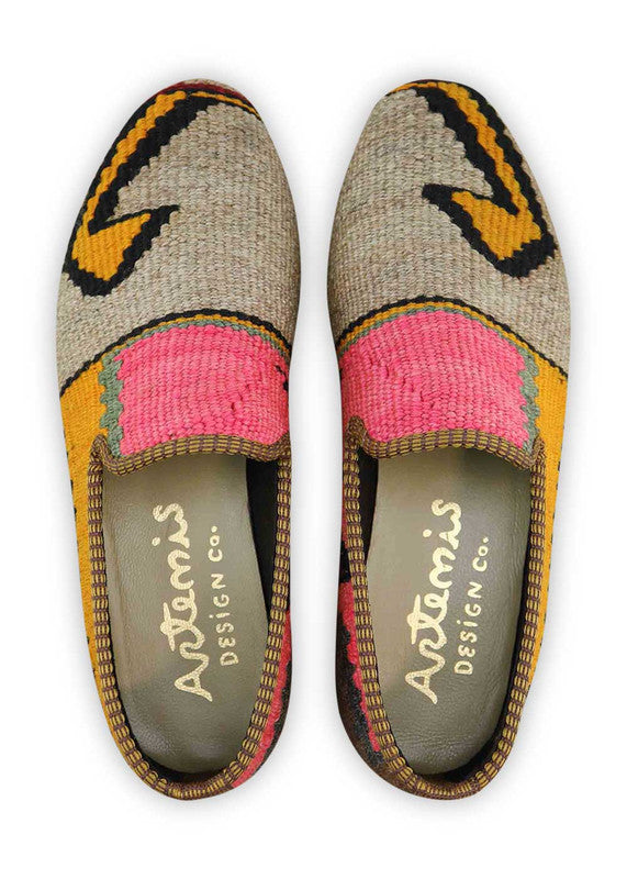 The Artemis Women's Smoking Shoe presents a stylish color combination of grey, black, yellow, pink, maroon, and khaki. These smoking shoes offer a delightful mix of neutral and vibrant tones, creating a chic and trendy look.  (Front View)